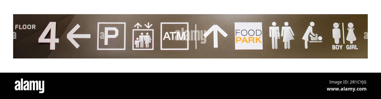 Panneau à la salle de bains sur la gauche est un symbole noir et blanc est accroché pour voir. Le signe contient des symboles fléchés à gauche, femmes, hommes, personnes handicapées, Banque D'Images