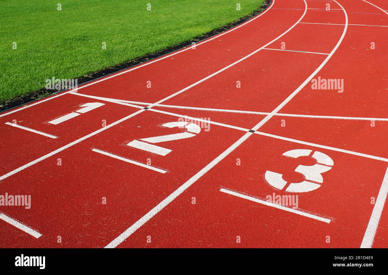 Numérotés de piste à une piste d'athlétisme Banque D'Images