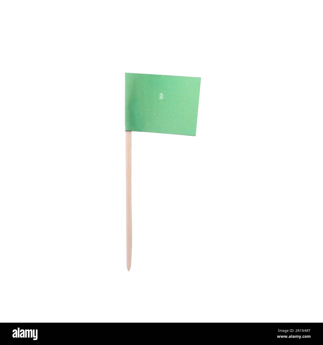 Petit drapeau de papier vert isolé sur blanc Banque D'Images