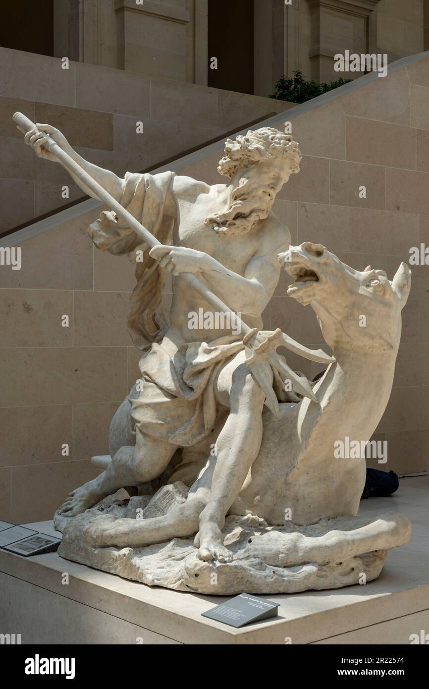 Paris, France - 05 13 2023 : Musée du Louvre. Sculpture Neptune sculptée par Antoine Coysevox Banque D'Images