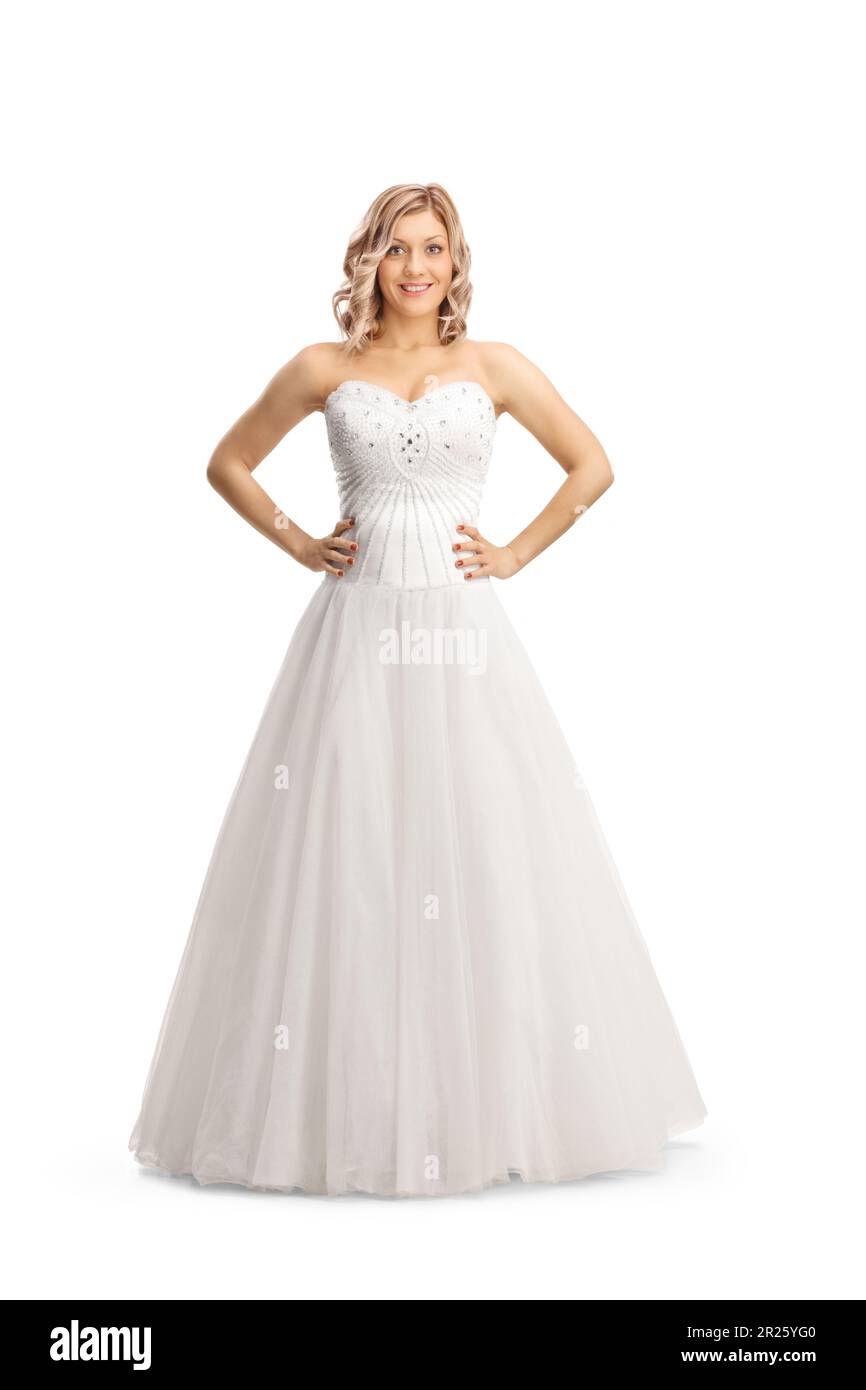 Belle mariée essayant sur une robe de mariage isolée sur fond blanc Banque D'Images