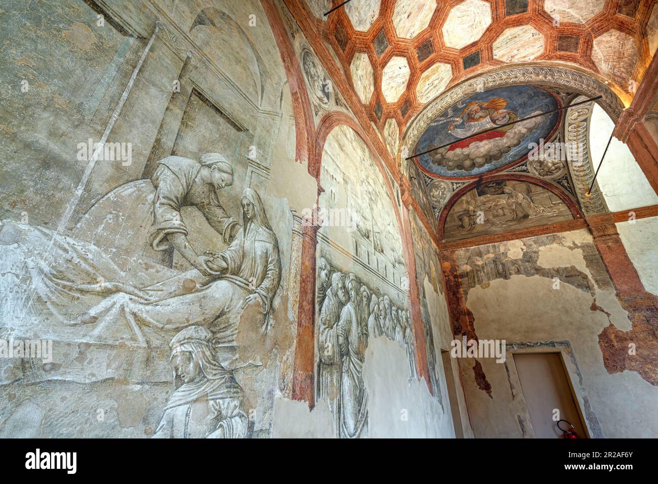 Fresques dans les cloîtres bénédictines de San Pietro, un complexe monumental extraordinaire à Reggio Emilia. Reggio Emilia, Emilie Romagne, Italie Banque D'Images