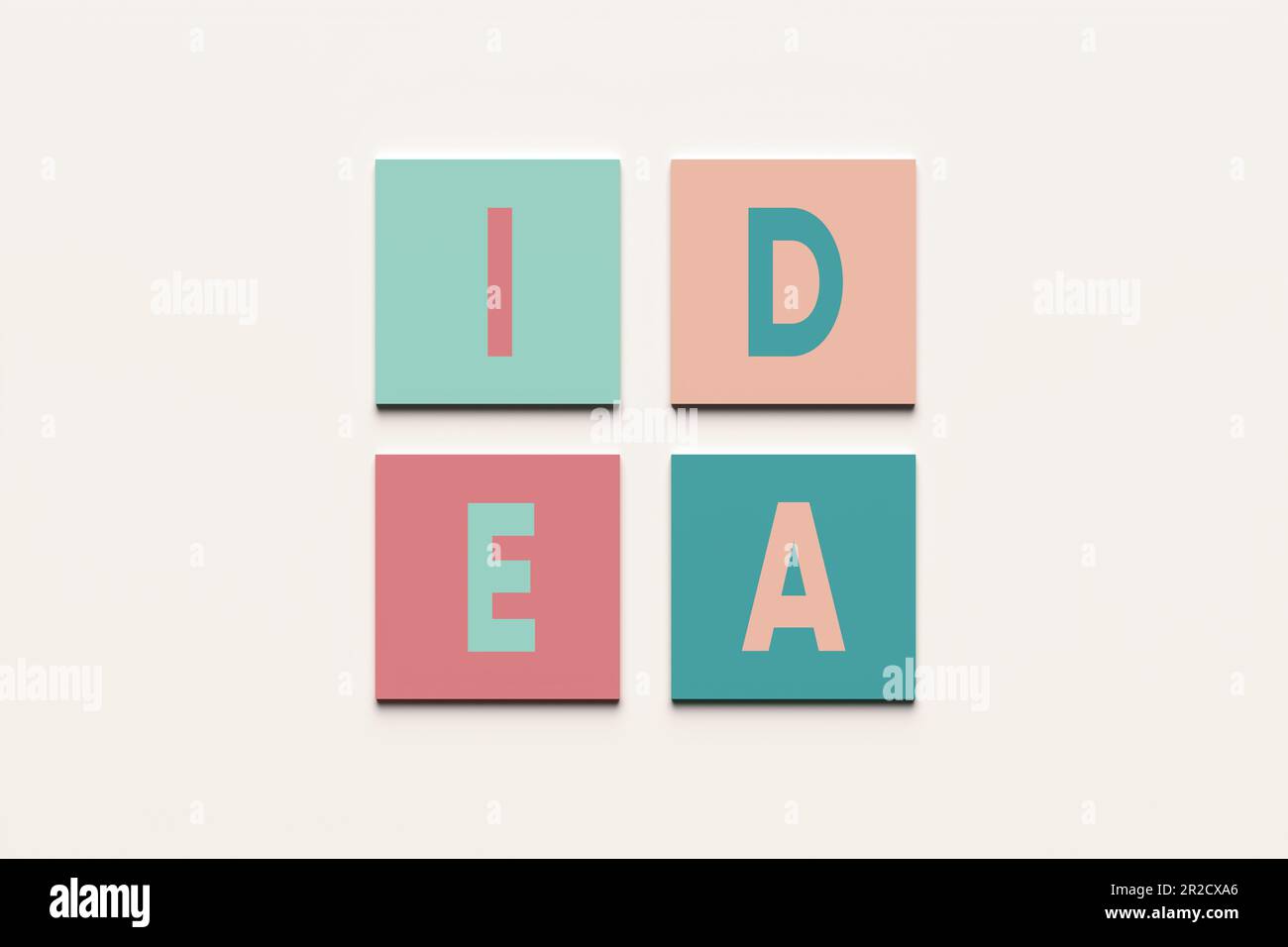 Création d'idées créatives, brainstorming et concept de solution d'entreprise. Travail d'équipe et idée. L'idée de mot sur des blocs carrés colorés. Banque D'Images