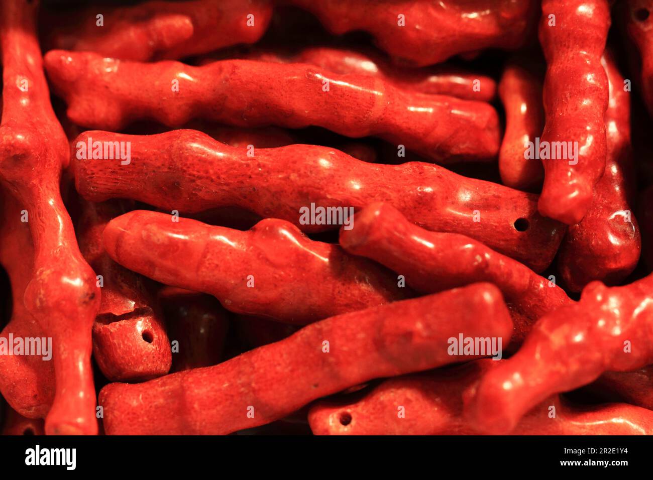 magnifique tissu corail rouge pour colliers comme arrière-plan Banque D'Images