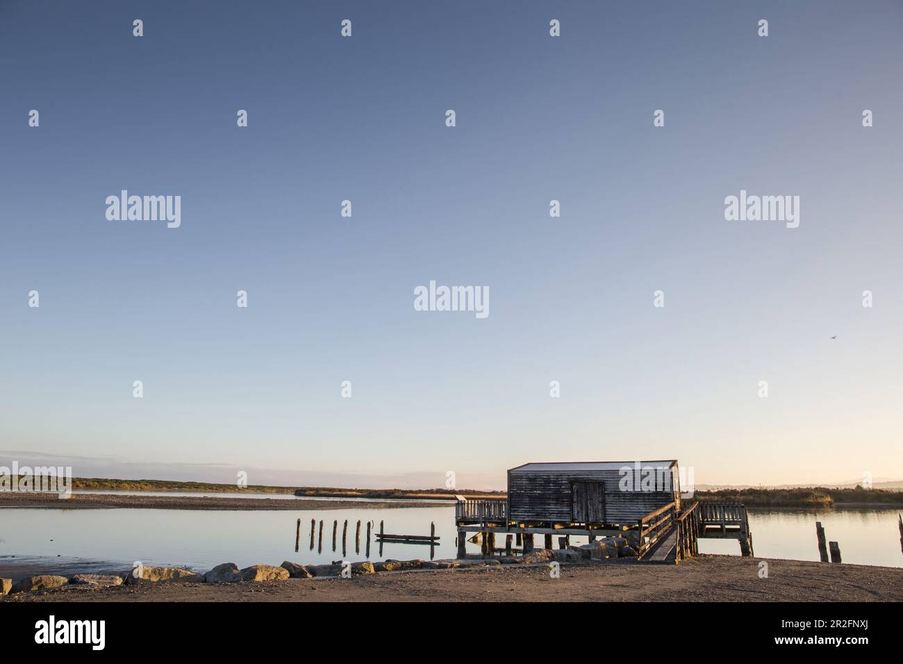 Coucher de soleil sur le lagon d'Okarito sur la côte ouest de la Nouvelle-Zélande Banque D'Images