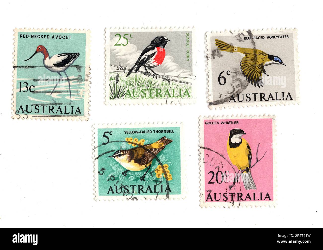 Timbres-poste d'époque d'Australie avec des oiseaux isolés sur fond blanc. Banque D'Images