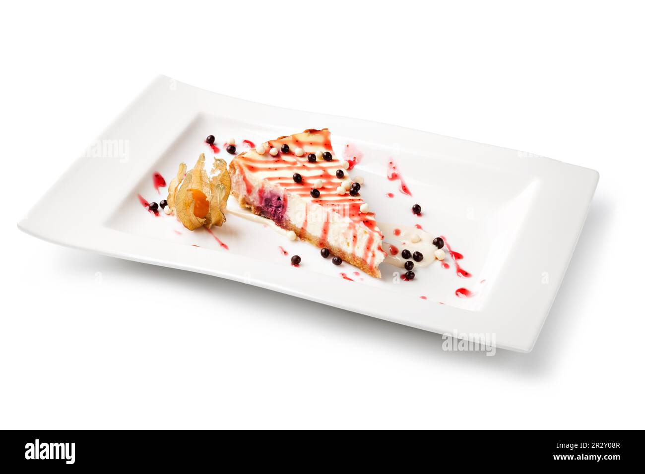 Gâteau au fromage sur une plaque blanche Banque D'Images