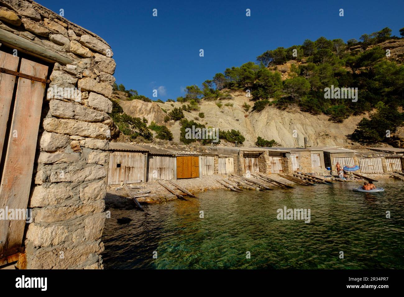 Casetas de varadero, Es Portitxol, Municipio de Sant Joan de LabritjaIbiza, Iles Baléares, Espagne. Banque D'Images