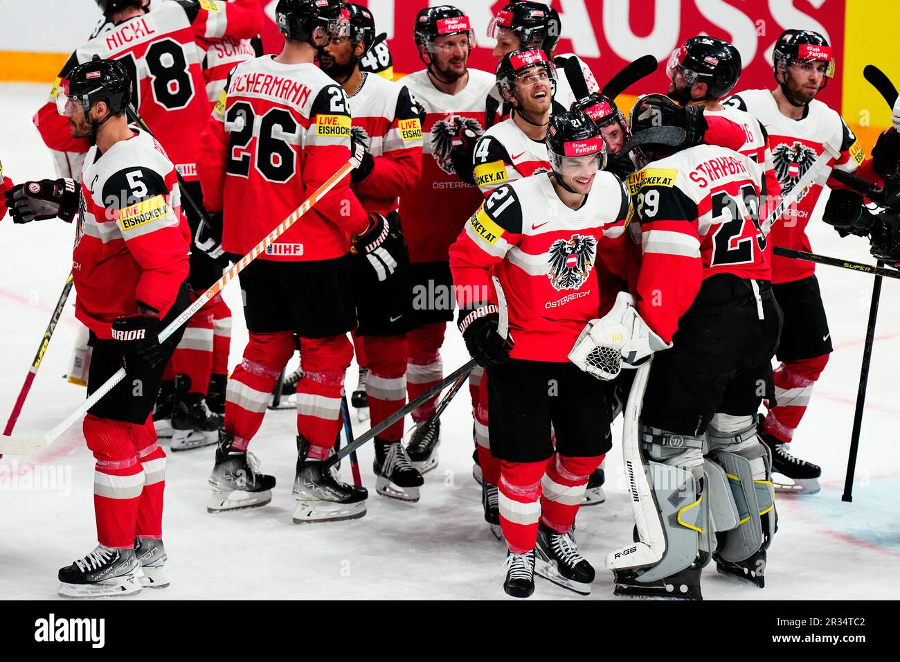 Austria's team players celebrate as they won the group A match between Austria and Hungary at the ice hockey world championship in Tampere, Finland, Monday, May 22, 2023. (AP Photo/Pavel Golovkin) Banque D'Images
