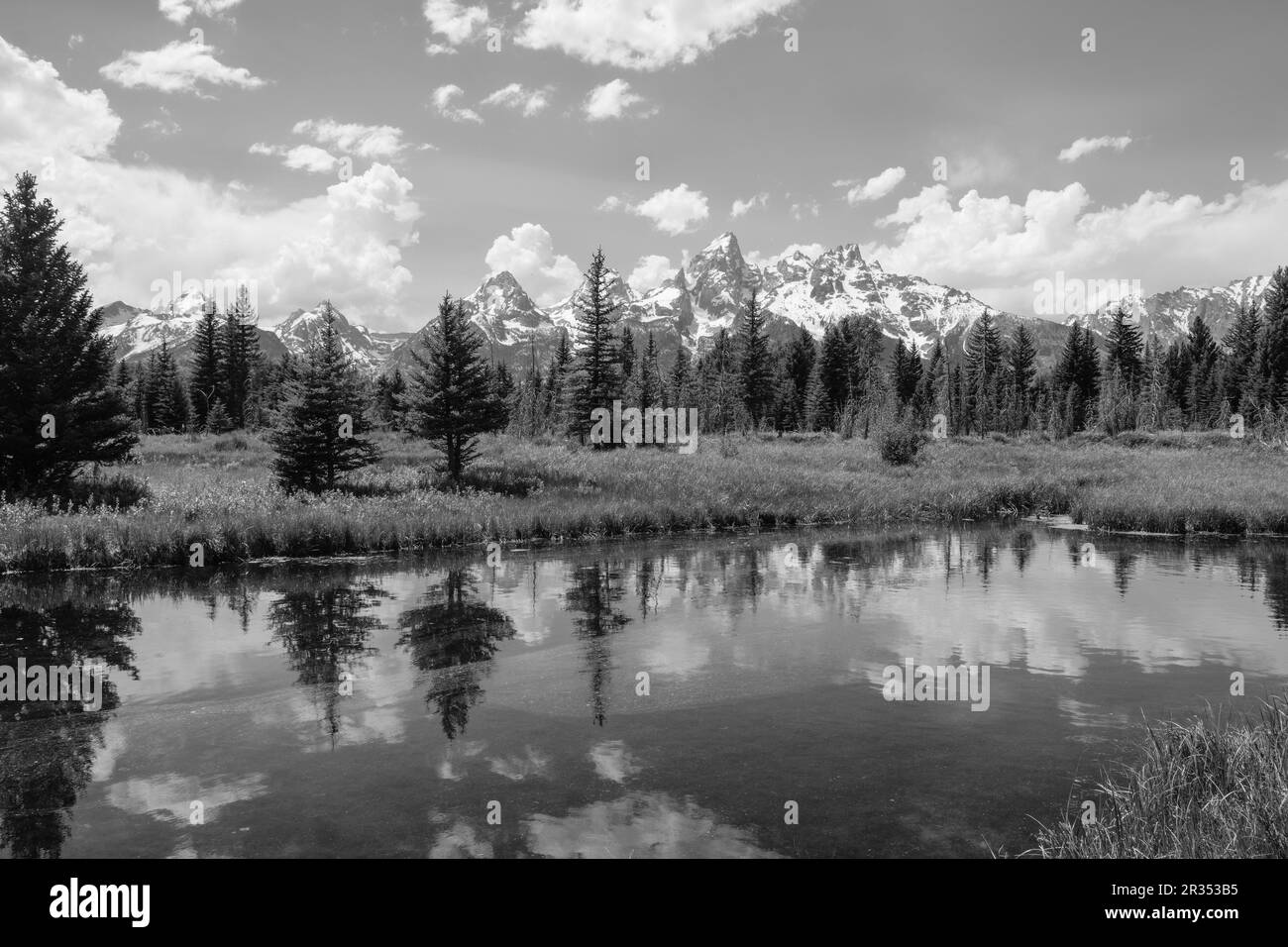 Montagnes Grand Teton et reflet dans Snake River Backwater Wyoming USA Banque D'Images