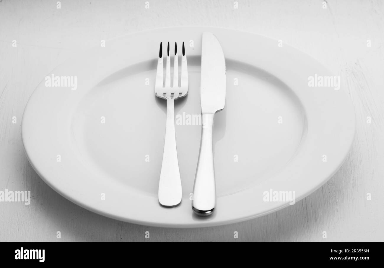 Des couverts sur une plaque Banque D'Images