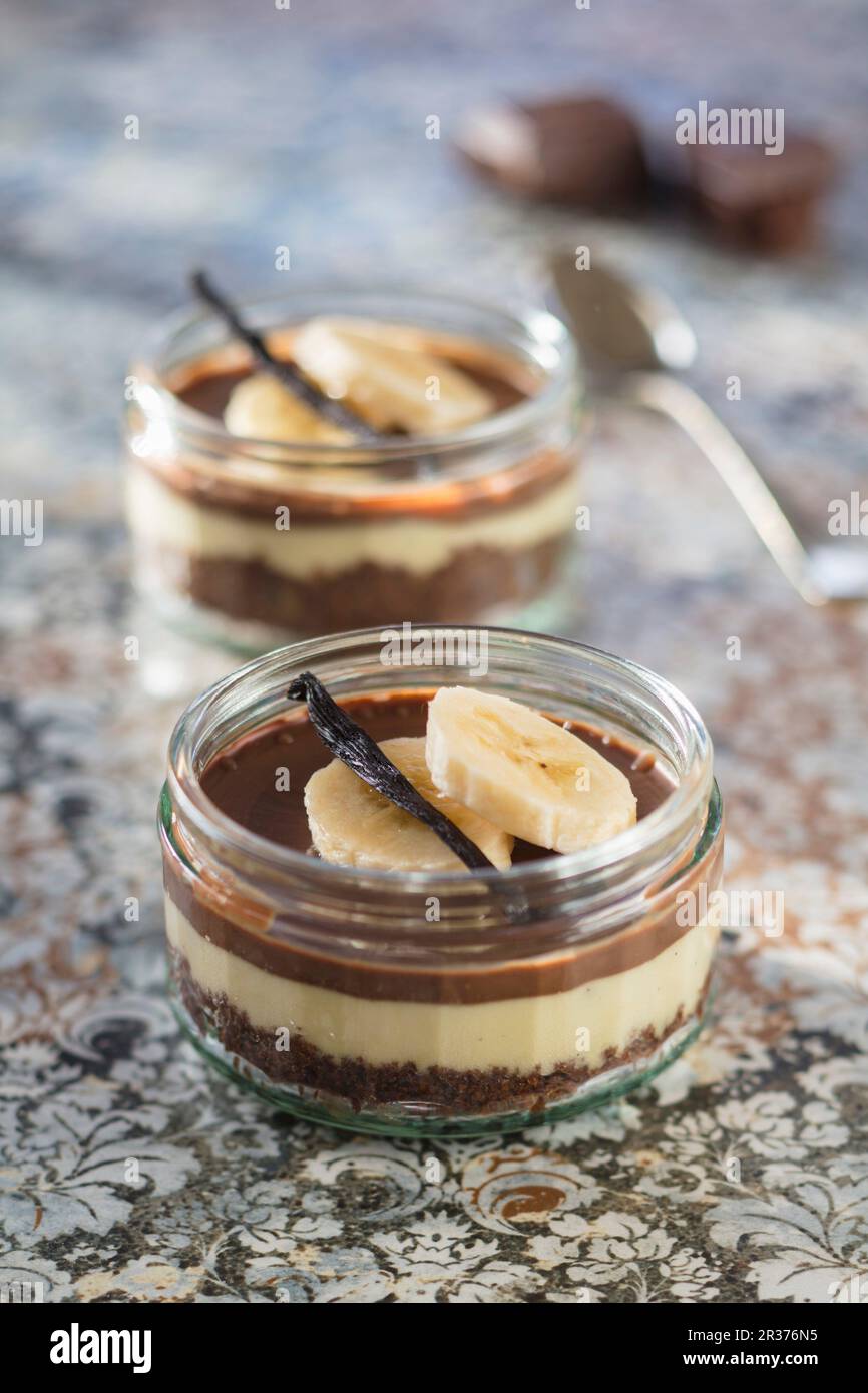 Cheesecake banane dans un verre Banque D'Images