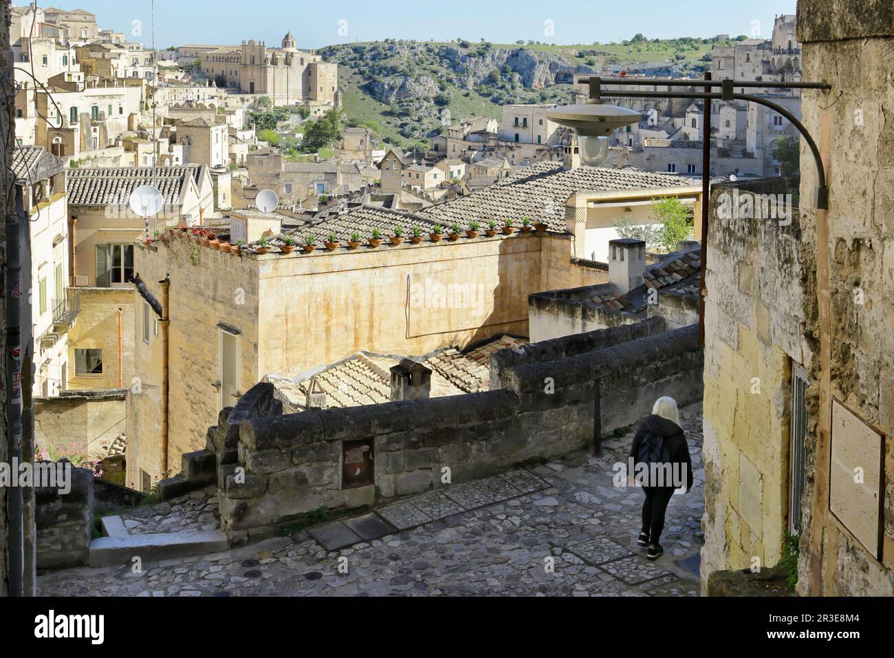 Moments dans la vie quotidienne locale dans le Sassi historique de Matera, Basilicate région de l'Italie. Banque D'Images