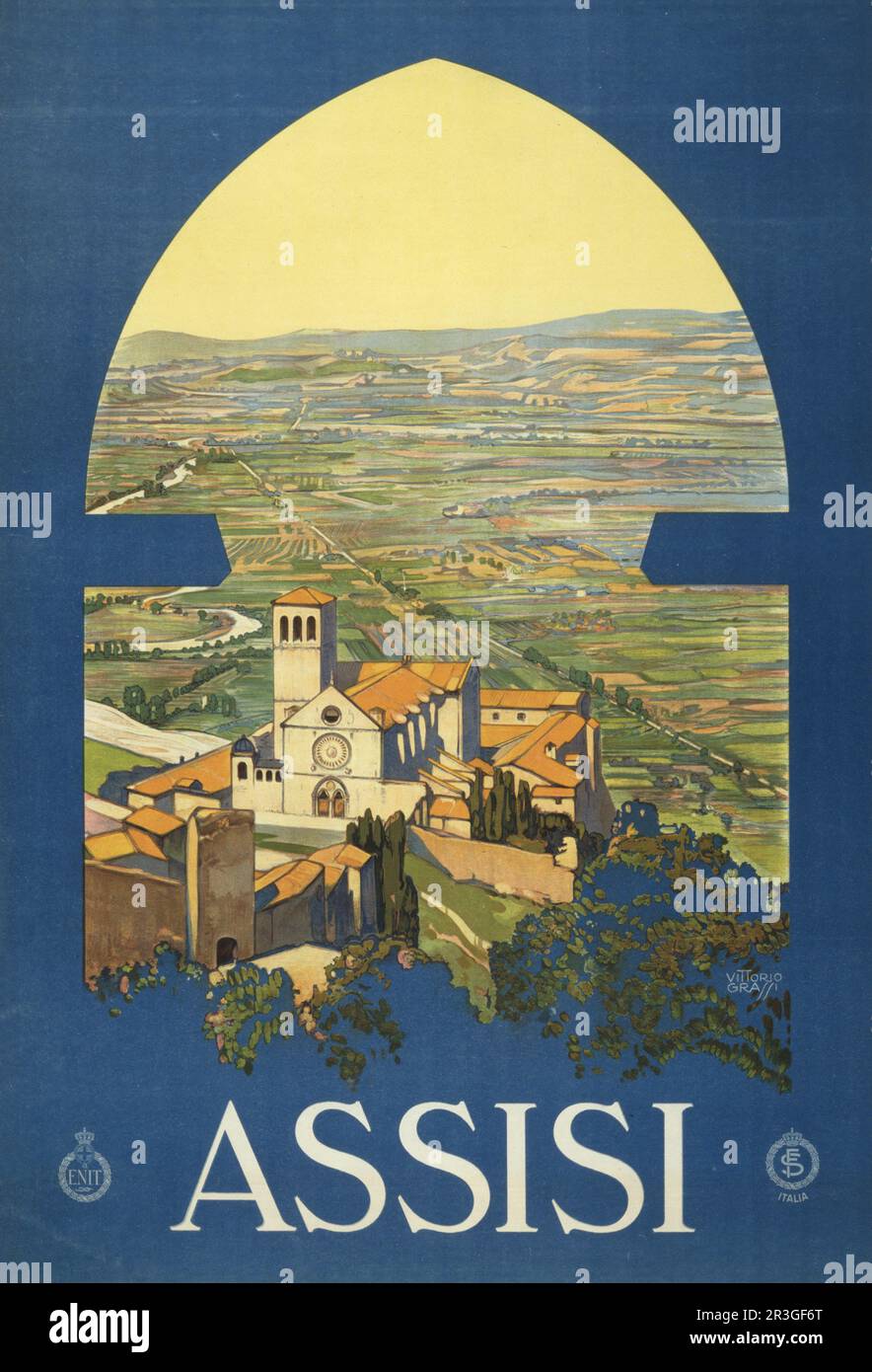Affiche de voyage vintage d'Assise, Italie, et la campagne comme si d'une fenêtre dans une tour, vers 1920. Banque D'Images
