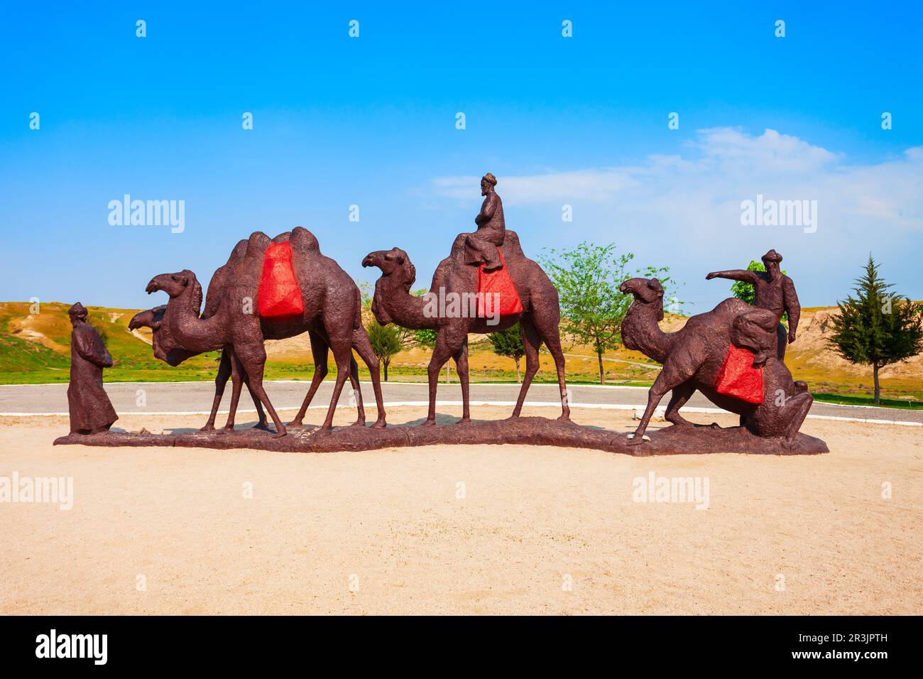 Monument Cameleer et camels au Musée Africasiab de Samarkand, un musée situé sur le site historique d'Afrasiyab Banque D'Images