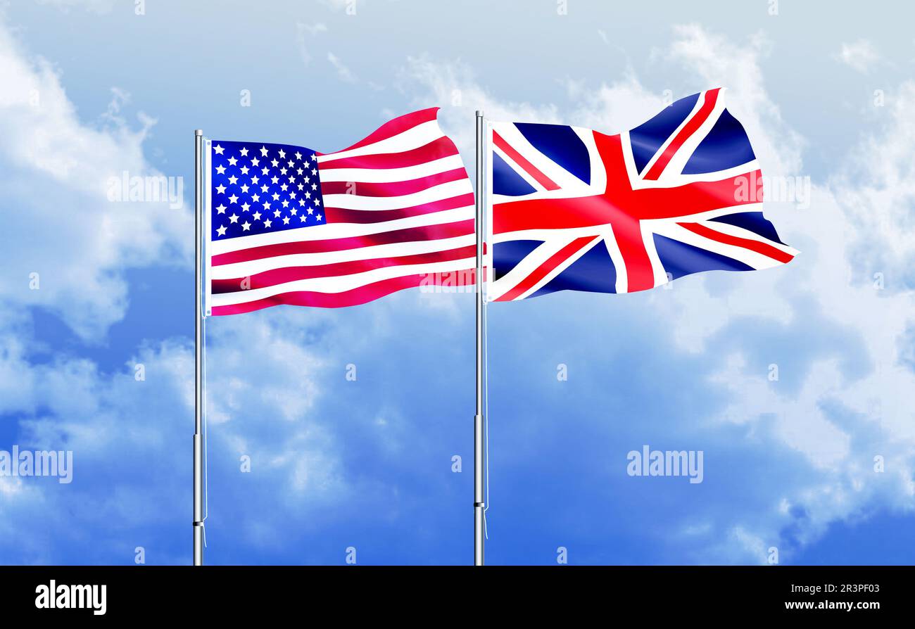 Les drapeaux américains et britanniques agitant contre le ciel bleu Banque D'Images