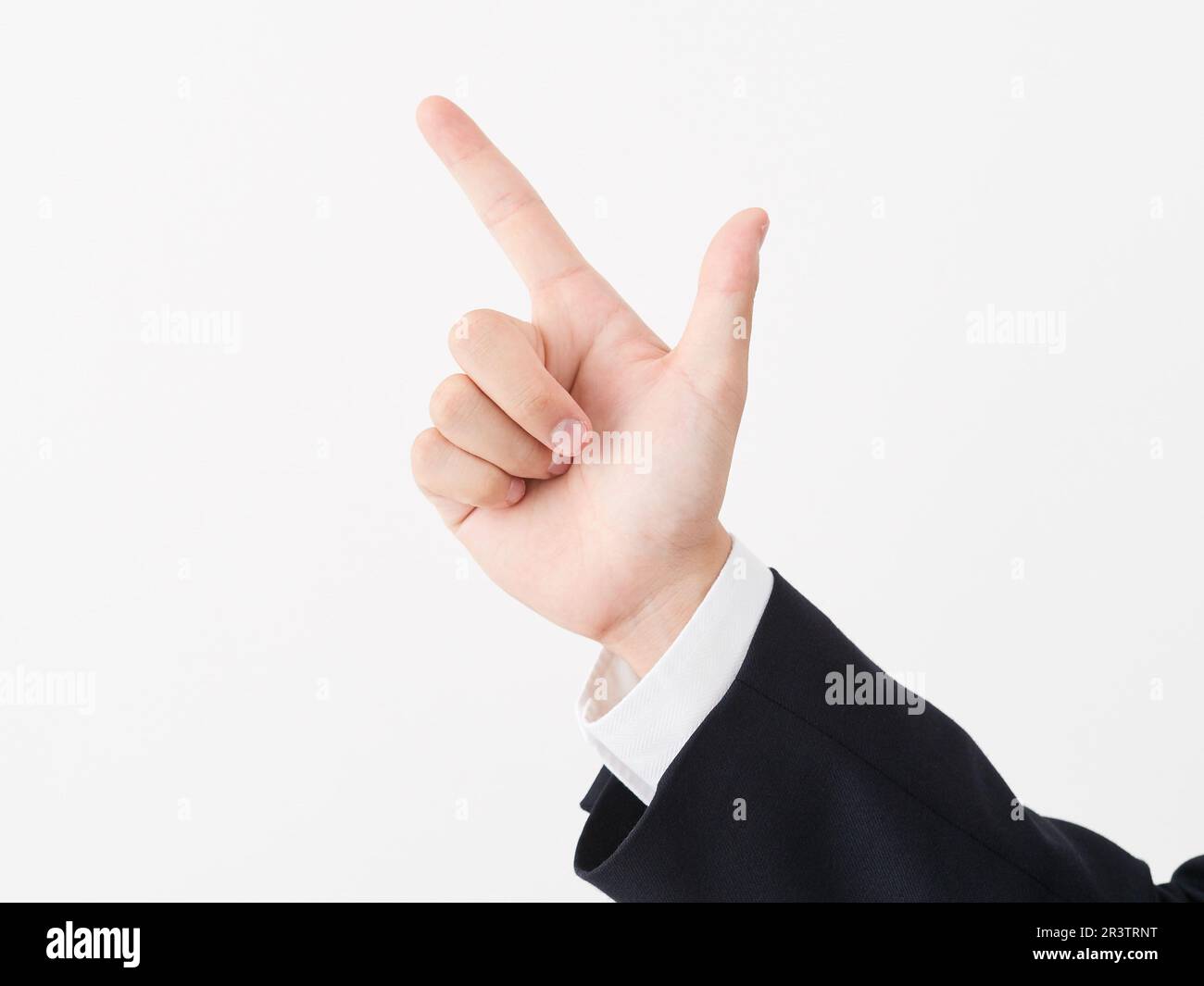 Homme d'affaires japonais pointant Banque D'Images