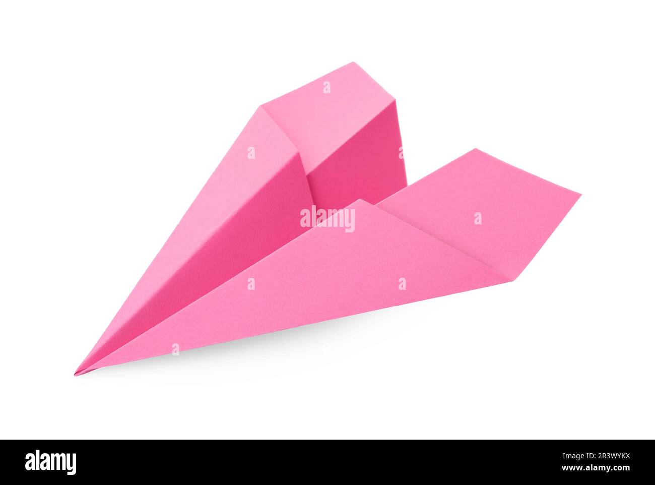 Avion en papier rose fait à la main isolé sur blanc Banque D'Images