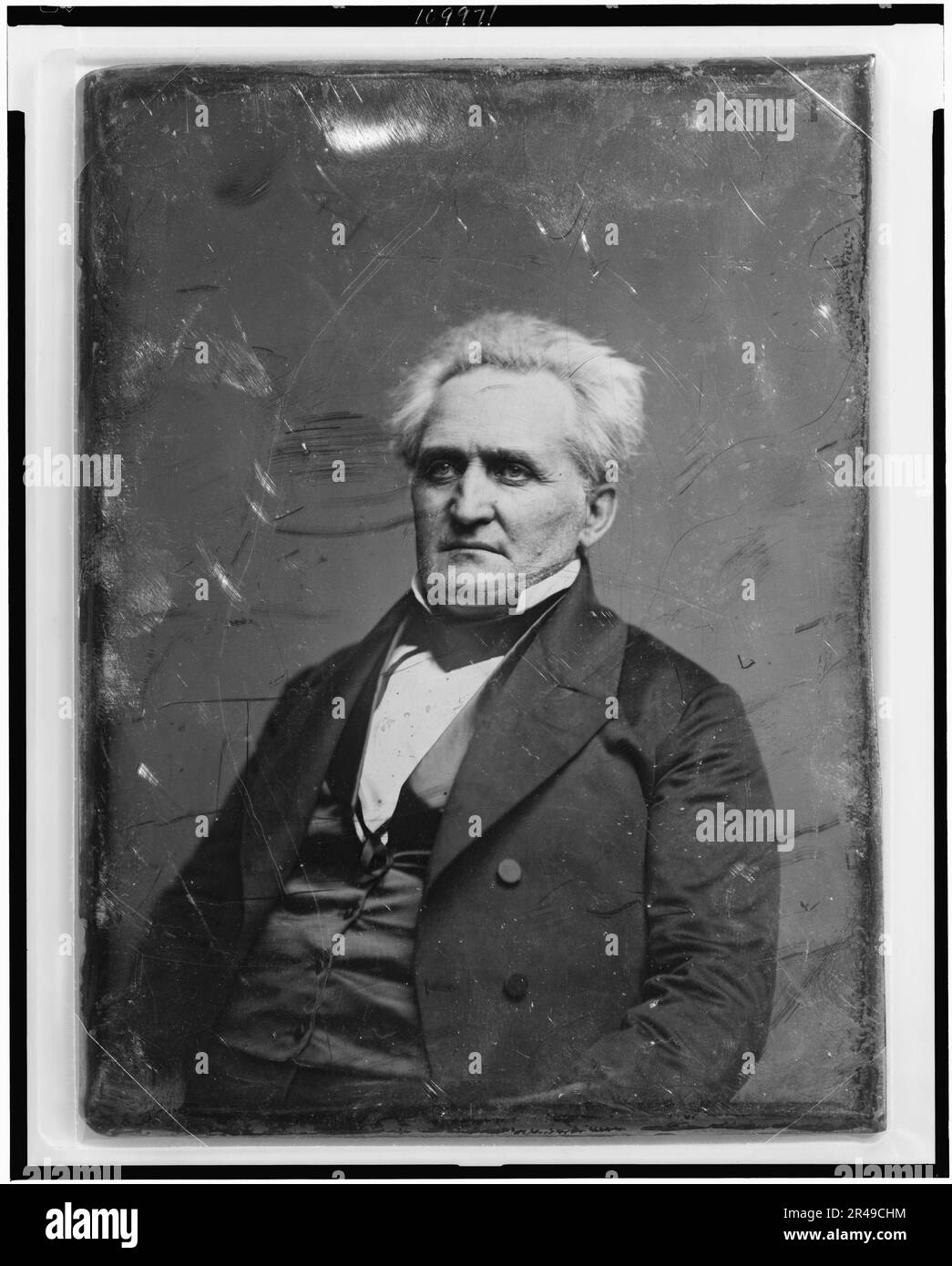 Homme non identifié, portrait en demi-longueur, trois quarts à gauche, entre 1844 et 1860. Banque D'Images