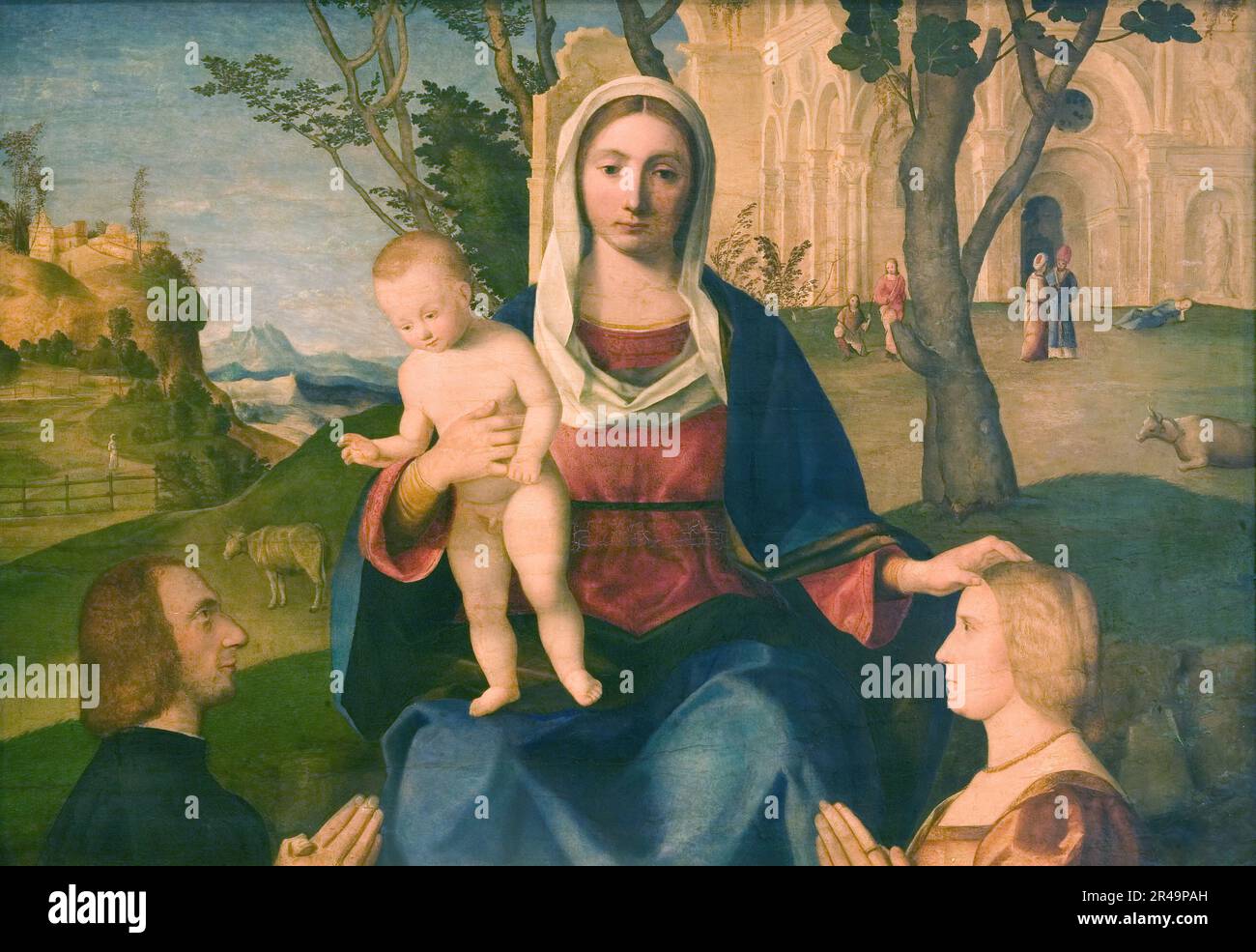 La Vierge à l'enfant avec un donneur masculin et un donneur féminin, 1485-1531. Précédemment attribué à Rocco Marconi (1504-1529). Banque D'Images