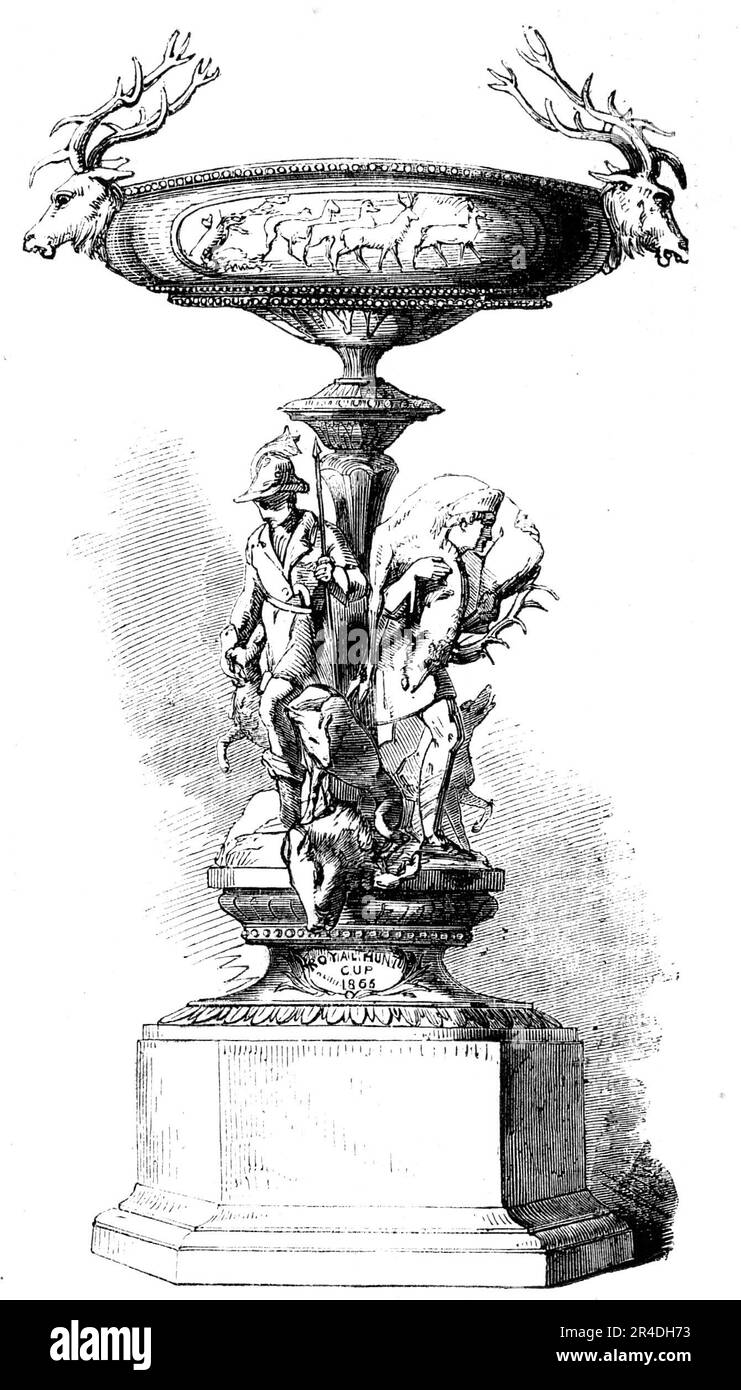 La plaque de course d'Ascot : la coupe Royale de chasse - mort du Boar, du Buck et du Fox, 1856. La "coupe Royale de chasse" est un bol en forme de tazza, soutenu sur une tige, autour de laquelle sont trois groupes distincts de figures, représentant la mort du sanglier, la mort du buck, et la mort du renard, tous admirablement modélisés, et de l'exécution la plus élaborée. Les chasseurs, les chiens et les animaux de la chasse sont de caractère distinct, mais tous s'unissent pour faire un tout parfait, plein de vérité vigoureuse. La visière est ornée de têtes de cerfs, qui forment ce qu'on peut appeler ses poignées; a Banque D'Images