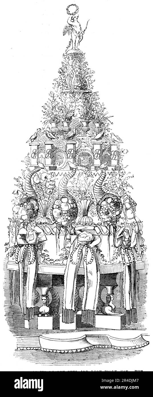 Mariage de sir Robert Peel et de Lady Emily Hay - le Bridecake, 1856. Le '... superbe gâteau de mariage... a été placé au centre de la table avec la collation de mariage, dans la Waterloo Gallery, à Apsley House. Le gâteau était de six pieds de hauteur, et était peut-être le plus grand morceau de confiserie sur l'enregistrement. Elle a été formée par trois étapes : la première vases de soutien de fleurs de mariée, avec cornucopies de fruits entre elles; la prochaine gradation a soutenu des piliers ornementaux; et la troisième, qui a été garé par des couronnes, boucliers exposés des bras de Tweeddale et Peel, avec leur mottepointe de famille respective Banque D'Images