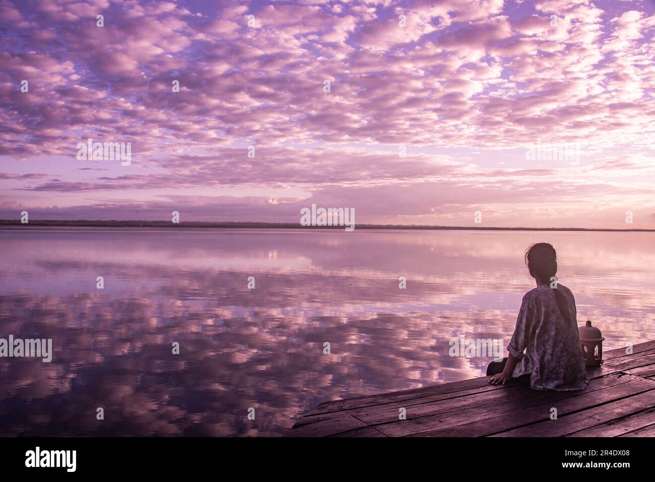 Coucher de soleil sur le lac Peten Itza, El Remate, Petén, Guatemala Banque D'Images