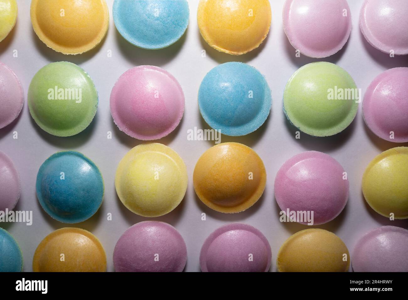 Arrière-plan avec bonbons ronds colorés Banque D'Images