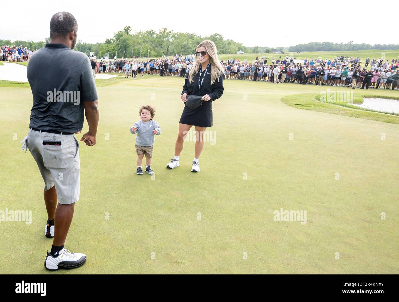 Individual champion Harold Varner III of RangeGoats GC celebrates alongside the trophy with his wife Amanda Varner and son Liam after winning LIV Golf DC at the Trump National Golf Club Washington DC on Sunday, May 28, 2023 in Sterling, Virginia. (Photo by Charles Laberge/LIV Golf via AP) Banque D'Images
