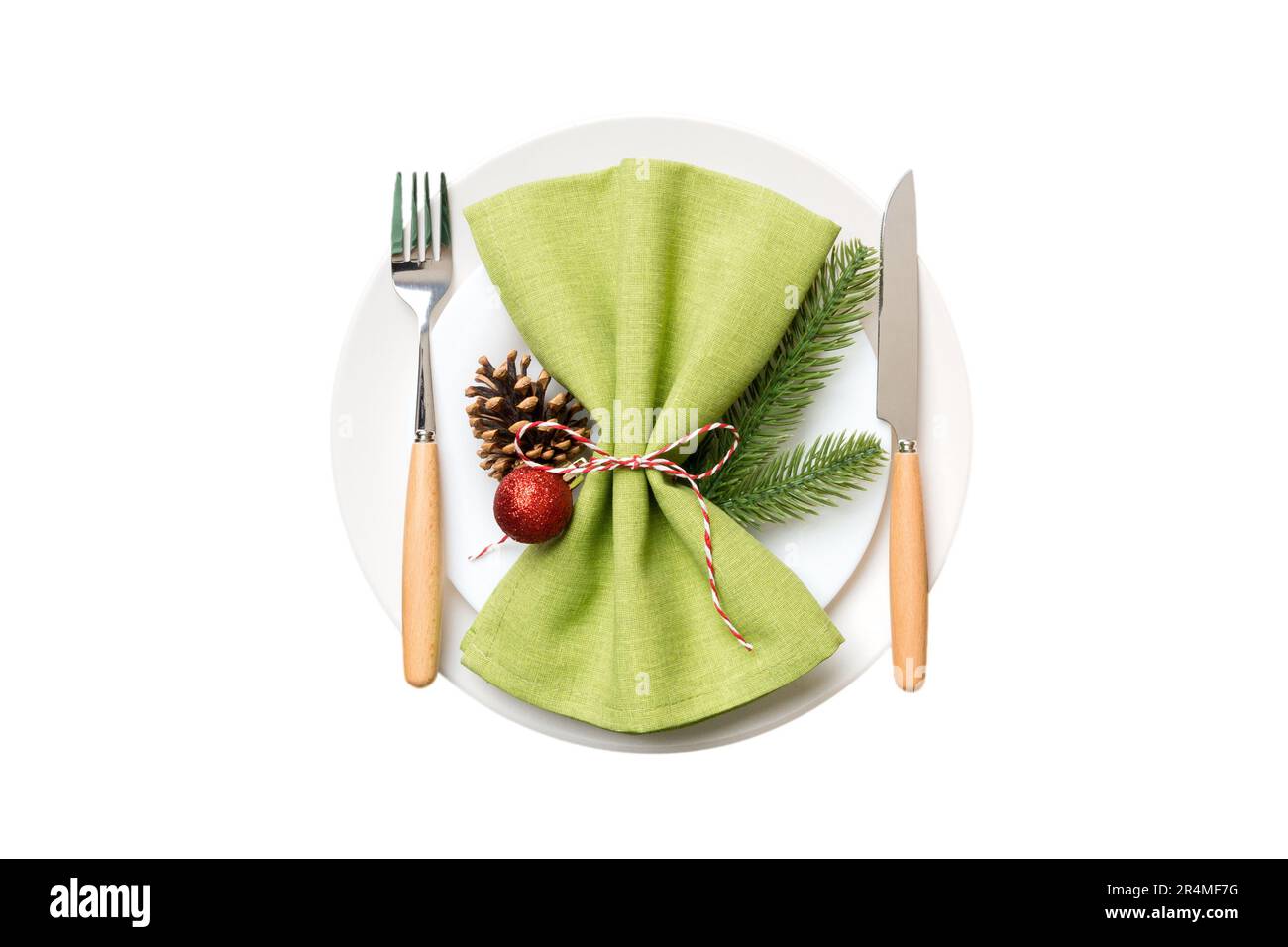Assiette de noël isolée avec décoration, fourchette et cuillère. Expérience  des fêtes du nouvel an. Vue de dessus Photo Stock - Alamy