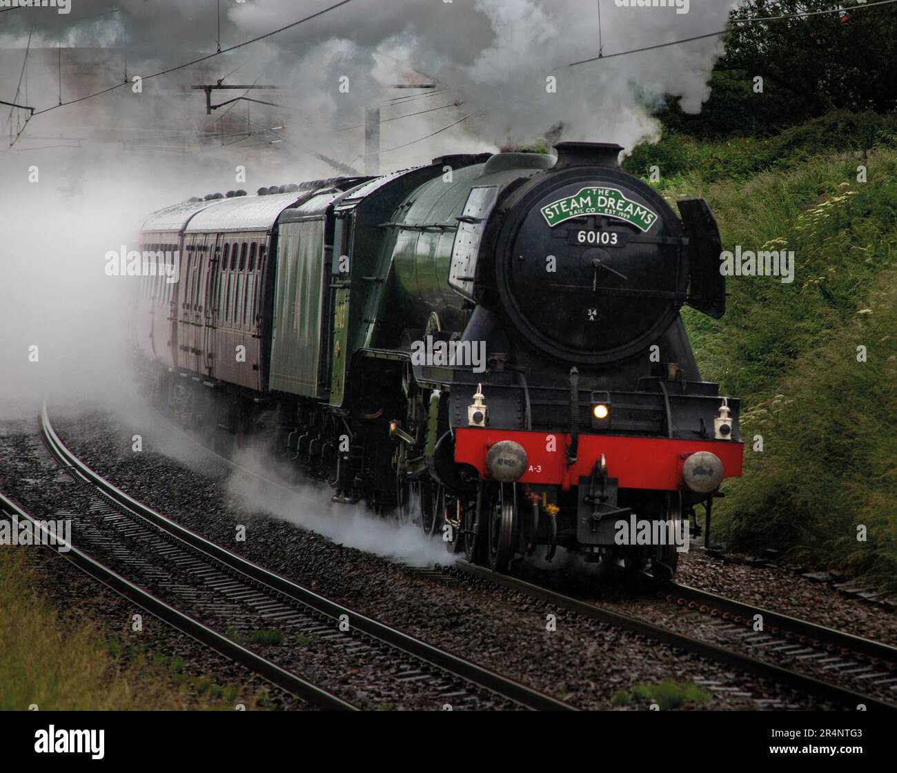 La locomotive à vapeur Flying Scotsman No.60103 le train le plus célèbre au monde en direction du nord à partir de Berwick sur Tweed. Northumberland, Angleterre Banque D'Images
