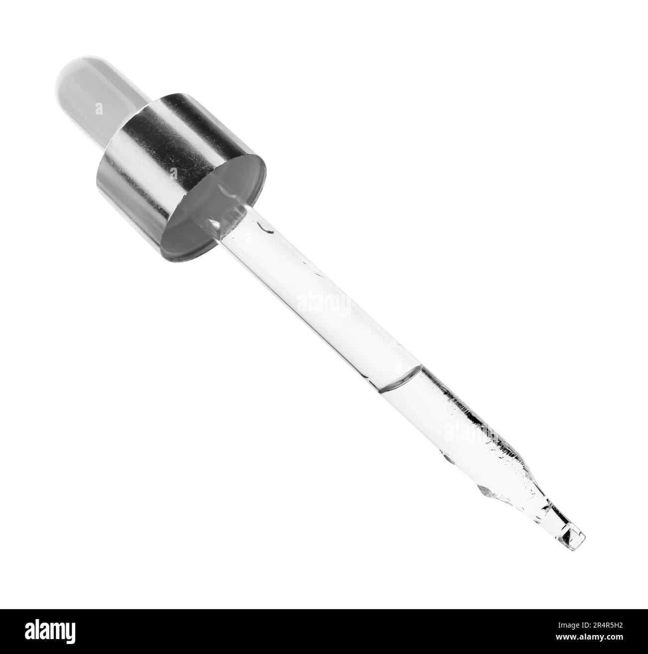 Pipette avec sérum facial isolé sur blanc Banque D'Images