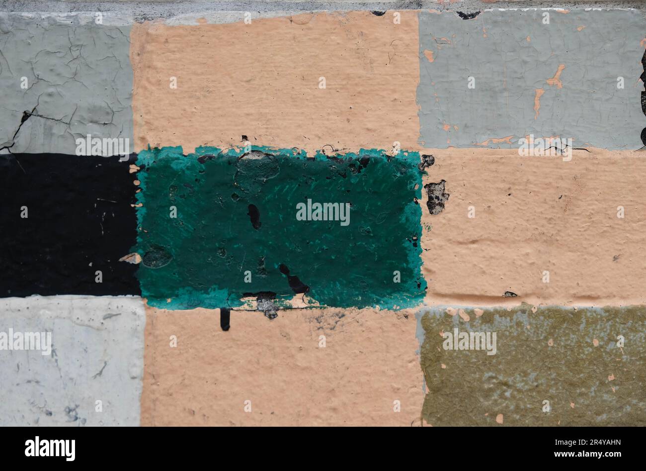 Rectangles peints sur le mur de briques Banque D'Images