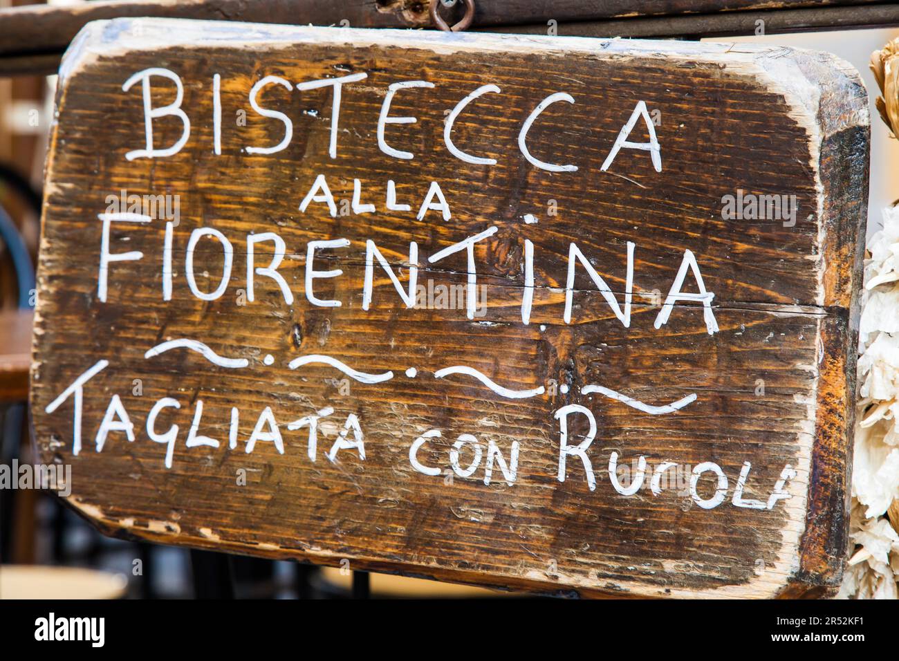 Signer en bois avec Bistecca alla Fiorentina (steak) mots de Florence Banque D'Images