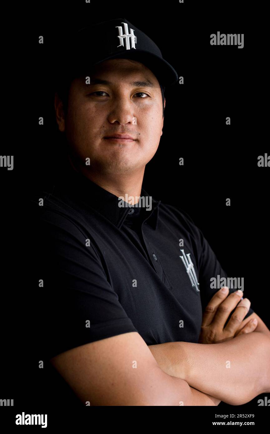 Sihwan Kim of Iron Heads GC Poses for his LIV Golf headshots ahead of
