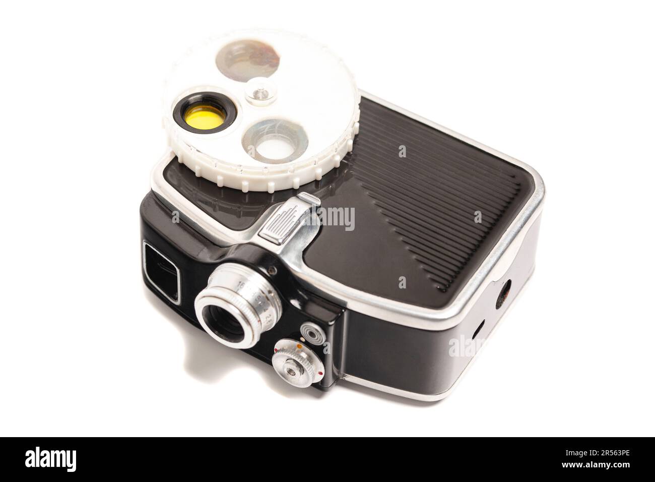 Caméra de cinéma vintage avec filtres isolés sur fond blanc. Banque D'Images