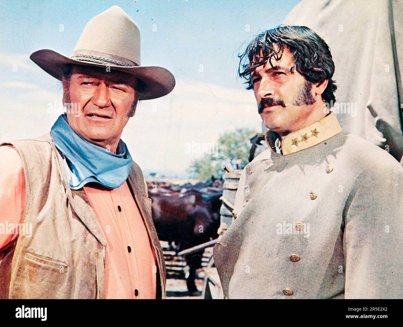 ROCK HUDSON et JOHN WAYNE dans THE UNFEEATED (1969), dirigé par ANDREW V. MCLAGLEN. Crédit: 20th CENTURY FOX / Album Banque D'Images