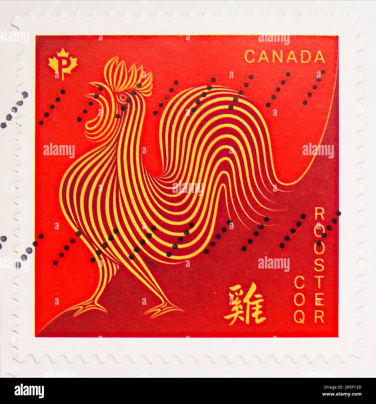 MOSCOU, RUSSIE - le 17 MAI 2023 : timbre-poste imprimé au Canada indique l'année du coq, nouvel an chinois 2017 - année de la série du coq, vers 201 Banque D'Images
