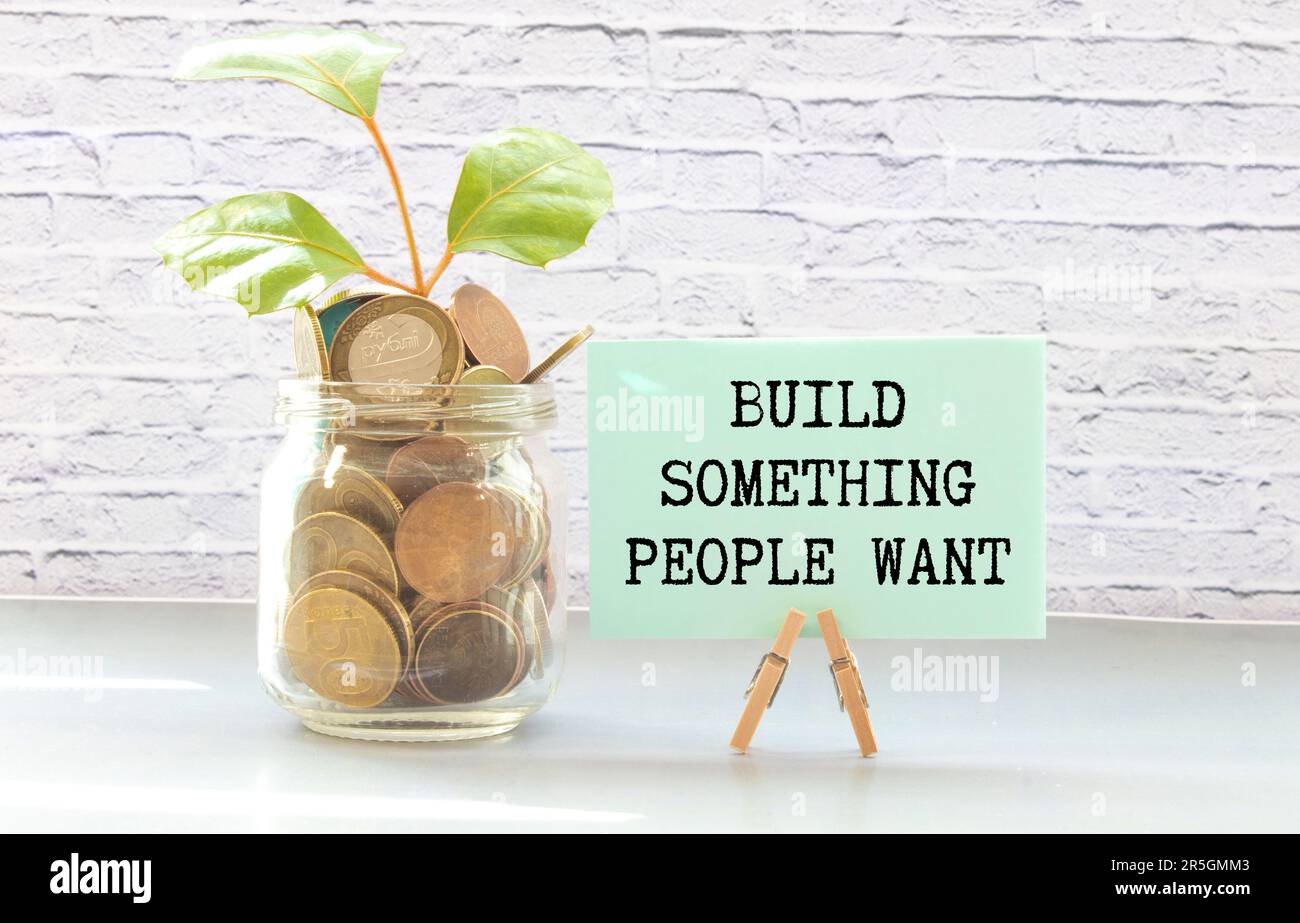 Blocs en bois avec les mots « construire quelque chose que les gens veulent » Banque D'Images