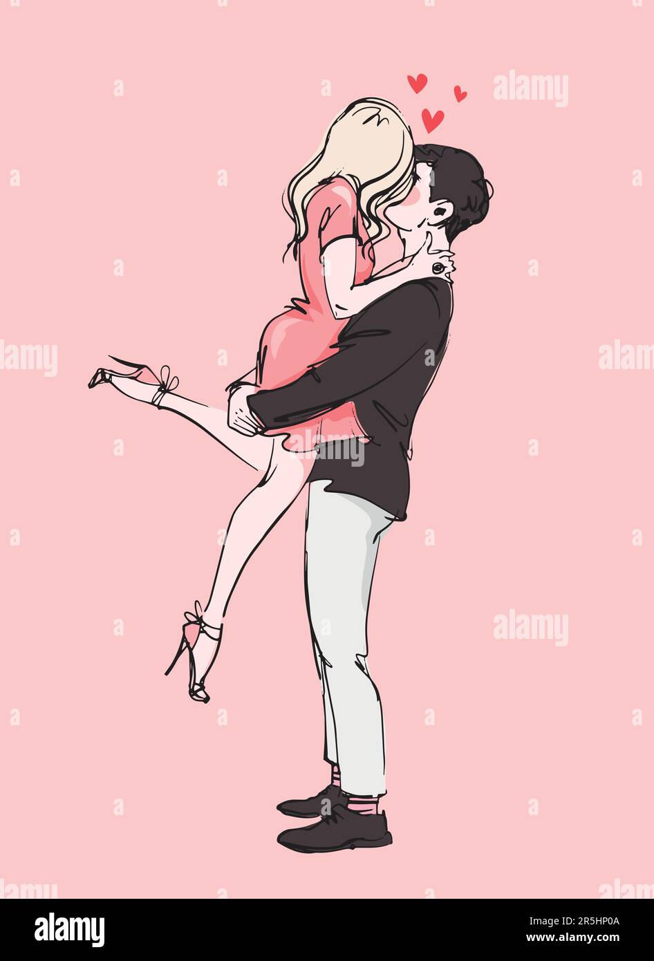 Un jeune couple en amour hugs, le gars a soulevé la fille vêtue d'une belle robe courte et