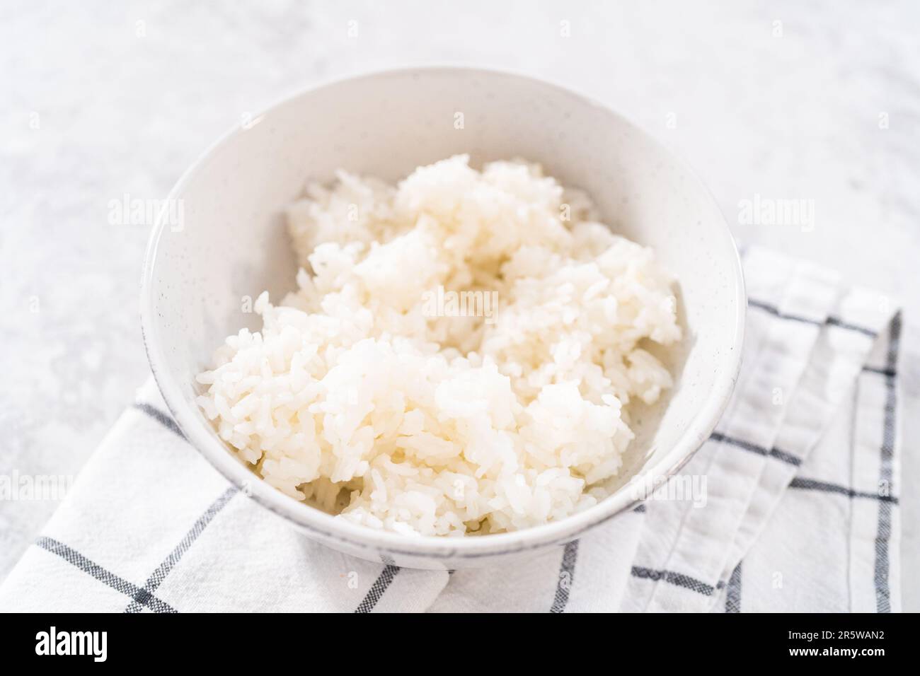 Cuisson du riz Banque D'Images Cuisson du riz Banque D'Images