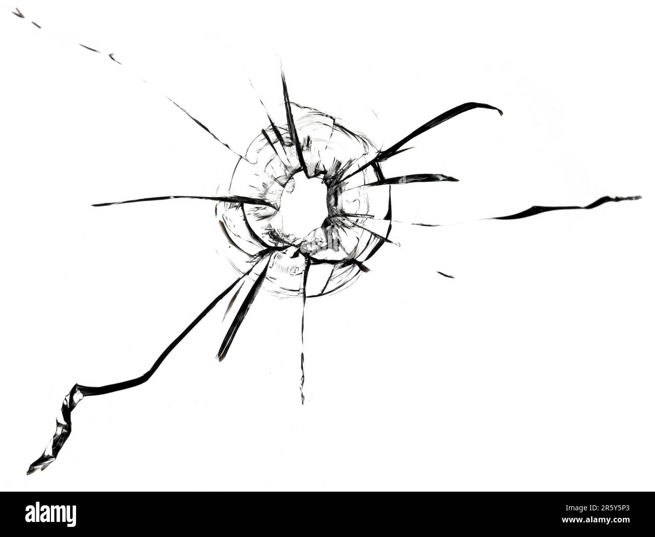 Fissures sur le verre à cause de coups de feu. Texture de fenêtre cassée. Banque D'Images