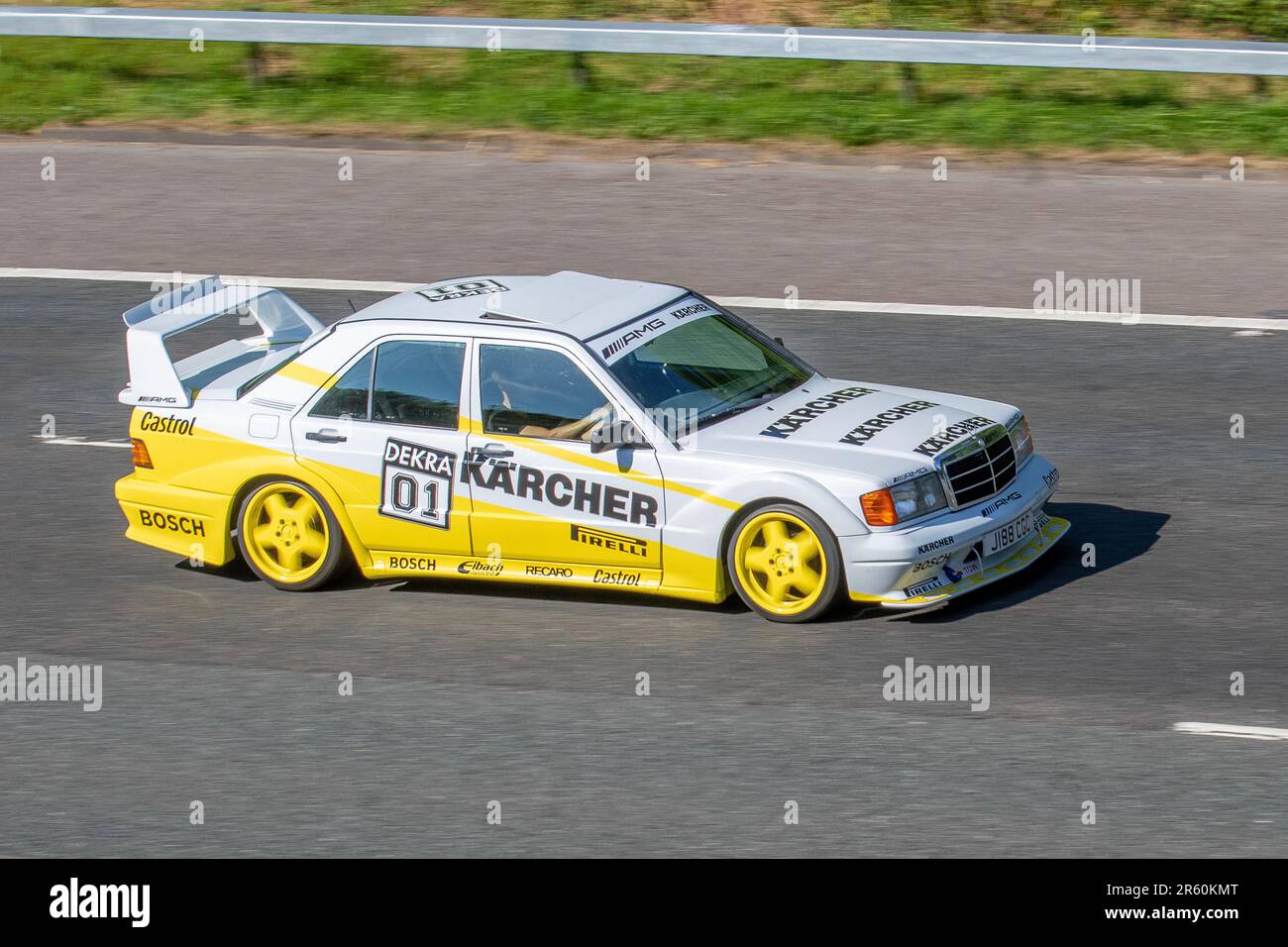 Années 1991 90 Nineties jaune Blanc Custom Mercedes 190E, Berline essence 1797 cc Decra 01 KARCHER véhicule de sport automobile modifié sponsorisé avec aileron arrière, autocollants et autocollants Banque D'Images