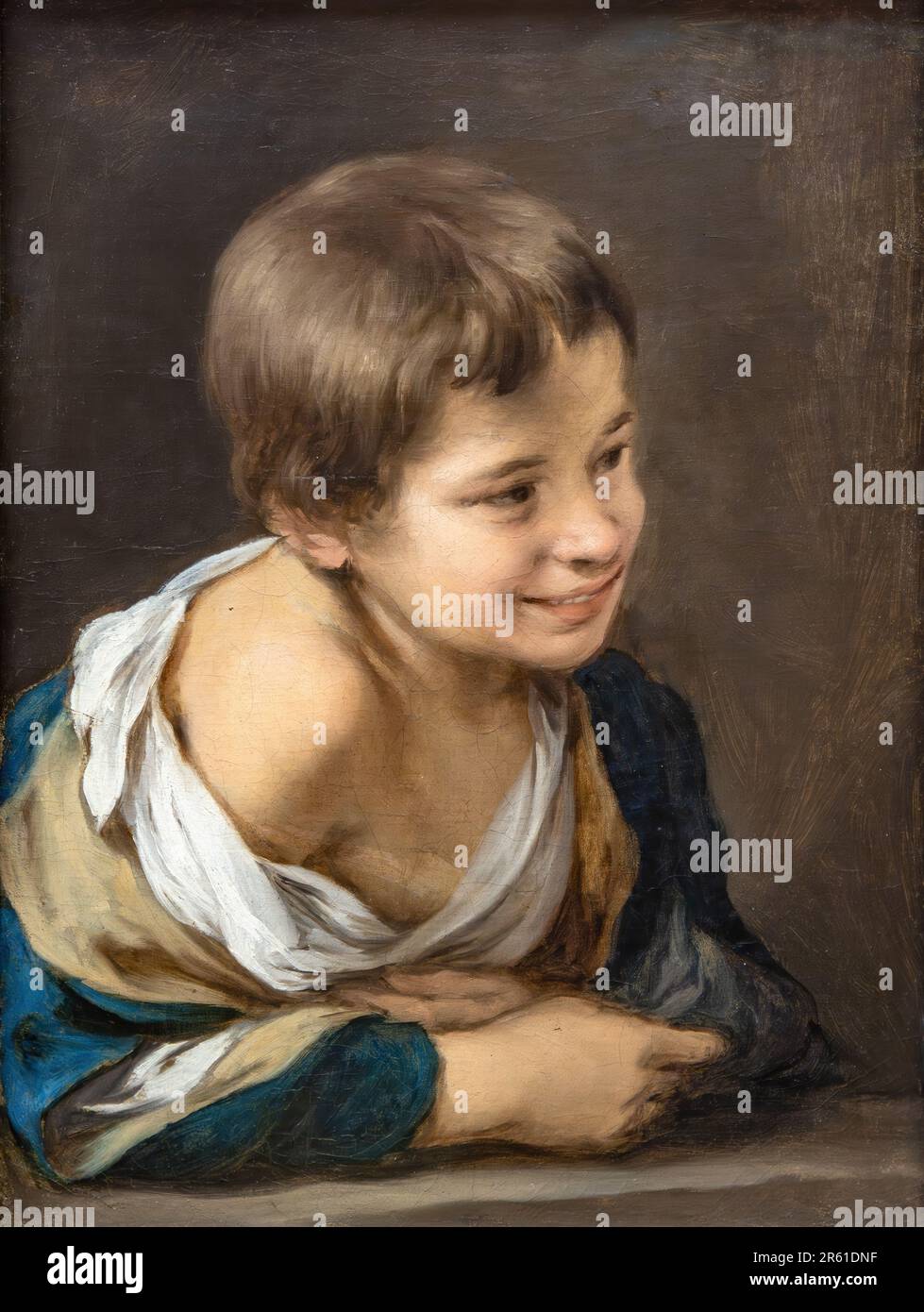 Peinture Bartolomé Esteban Murillo titré Un petit garçon paysan appuyé sur un seuil. Représente un garçon paysan qui s'appuie sur un bloc de pierre ou un seuil ébréché et regarde Banque D'Images