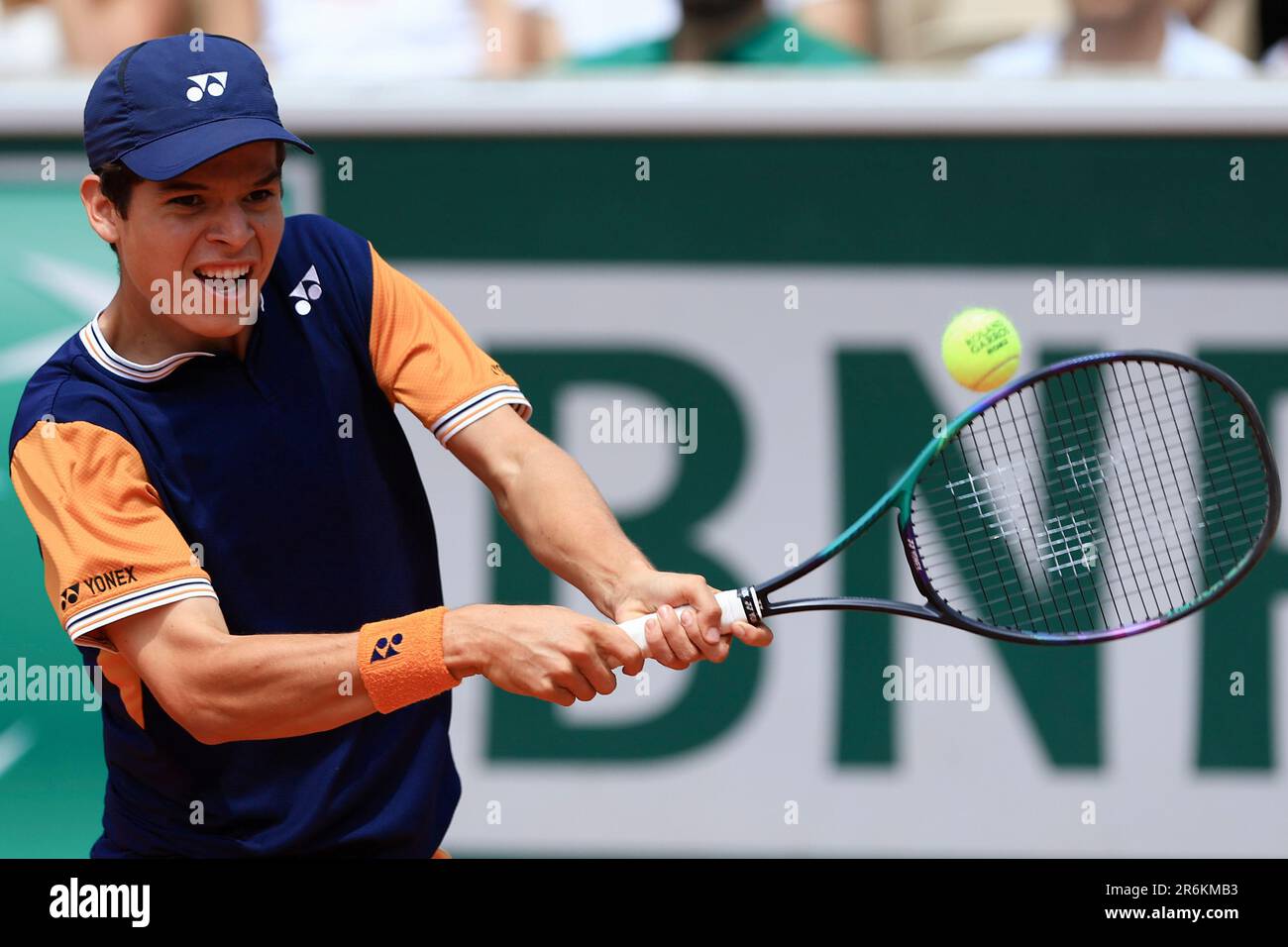 Bolivia's Juan Carlos Prado Angelo plays a shot against Croatia's Dino Prizmic during their final match of the Boys' Singles French Open tennis tournament at the Roland Garros stadium in Paris, Saturday, June 10, 2023. (AP Photo/Aurelien Morissard) Banque D'Images