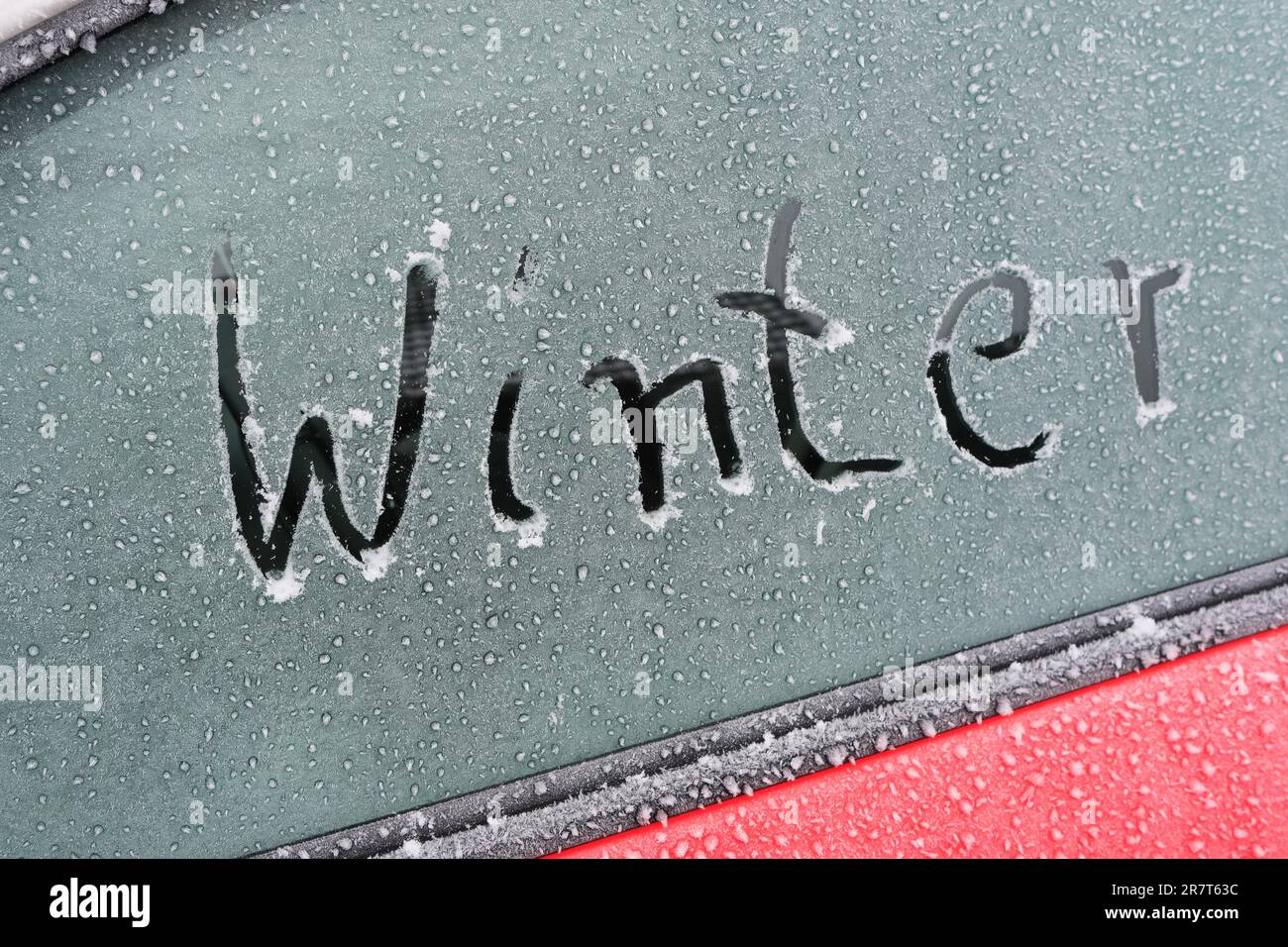 Fenêtre de voiture gelée avec inscription Winter, Rhénanie-du-Nord-Westphalie, Allemagne Banque D'Images