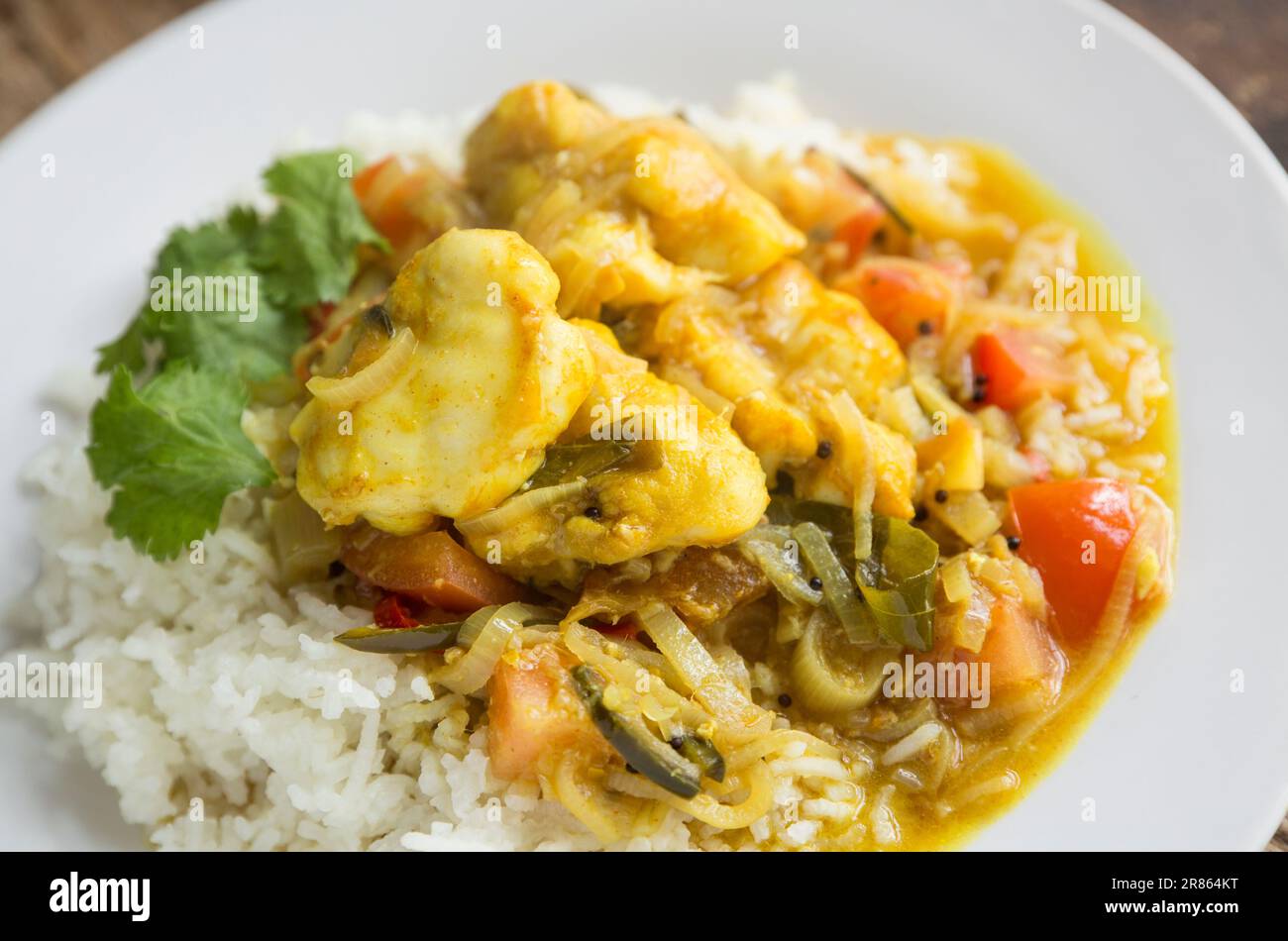 Les joues d'un rayon de Thornback, Raja clavata, r. clavata, qui a été attrapé dans la Manche. Ils ont été homecooked dans un curry de poisson. Le chee Banque D'Images