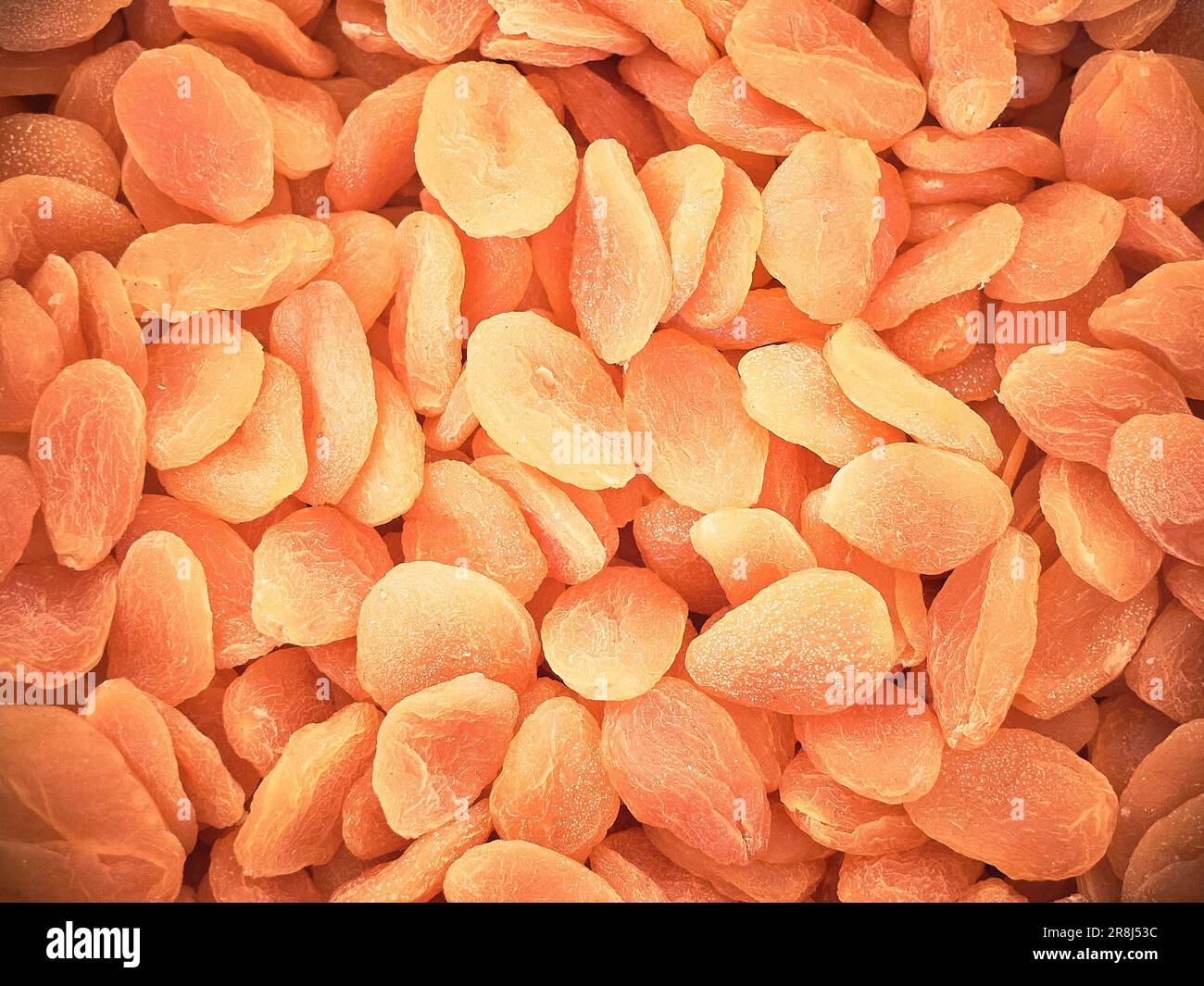 Abricots séchés. Tas d'abricots séchés comme arrière-plan Banque D'Images
