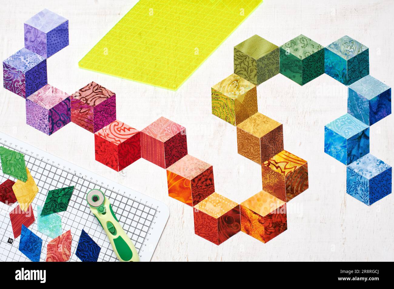 Conception abstraite de tissus colorés qui ressemblent à des cubes, des outils de courtepointe Banque D'Images