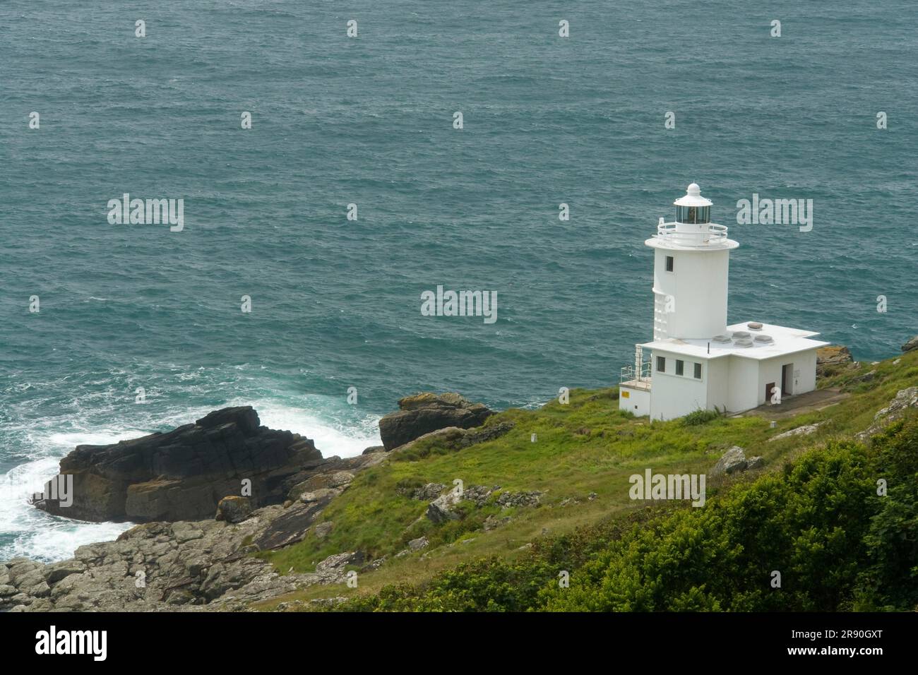 Lighthouse Tater-du, Lamorna Cove, Cornwall, Angleterre, Royaume-Uni Banque D'Images